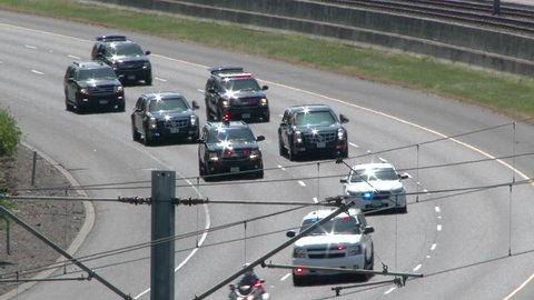 Portland, Oregon - May 2015: President Barack Obama being transported in highly secure motorcade while visiting Portland Oregon.