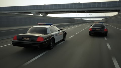 02256 Police Cars In Speed Travelling On Road