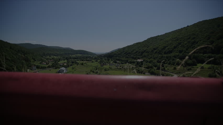 Landscape shot of a moody sight in tzhe valley next to the road.