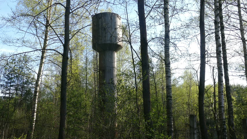 Water tower in the forest