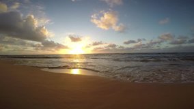 Sunrise on Kapaa Beach on the island of Kauai, Hawaii
